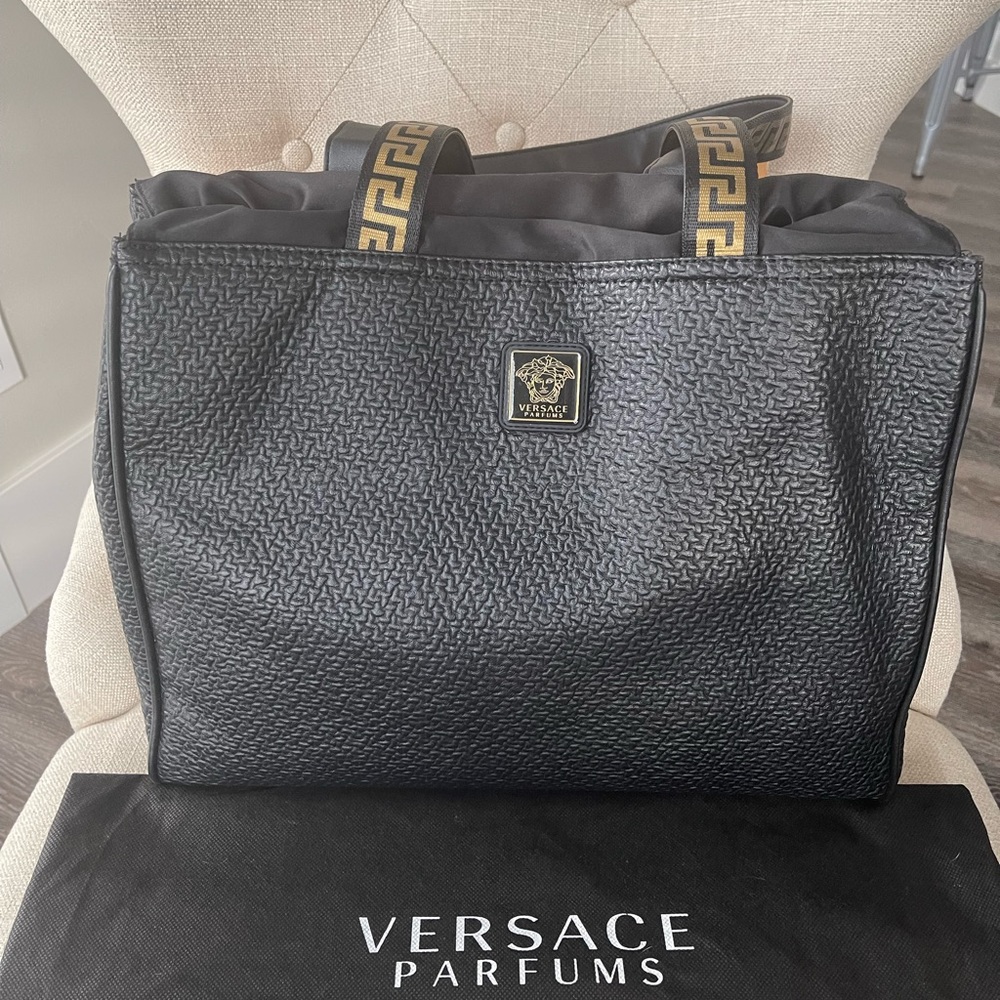 New Tote bag by Versace Parfums comes with dust bag.